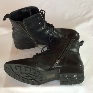 Black leather combat boots lace up